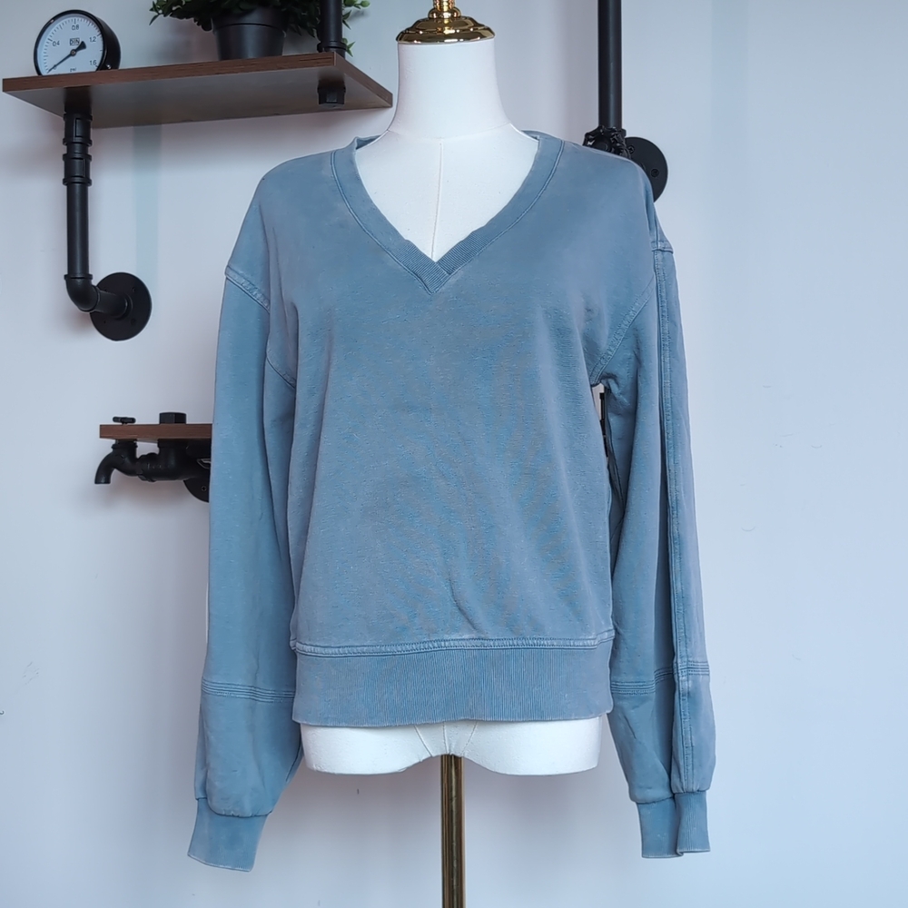 Relaxed Universal Thread Washed V-Neck Sweater in Slate Blue. Model Off-Duty